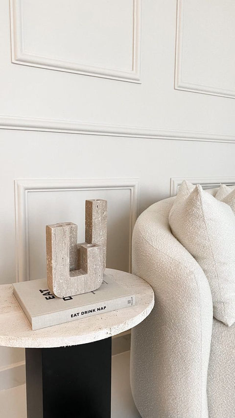 Mnaya travertine side table